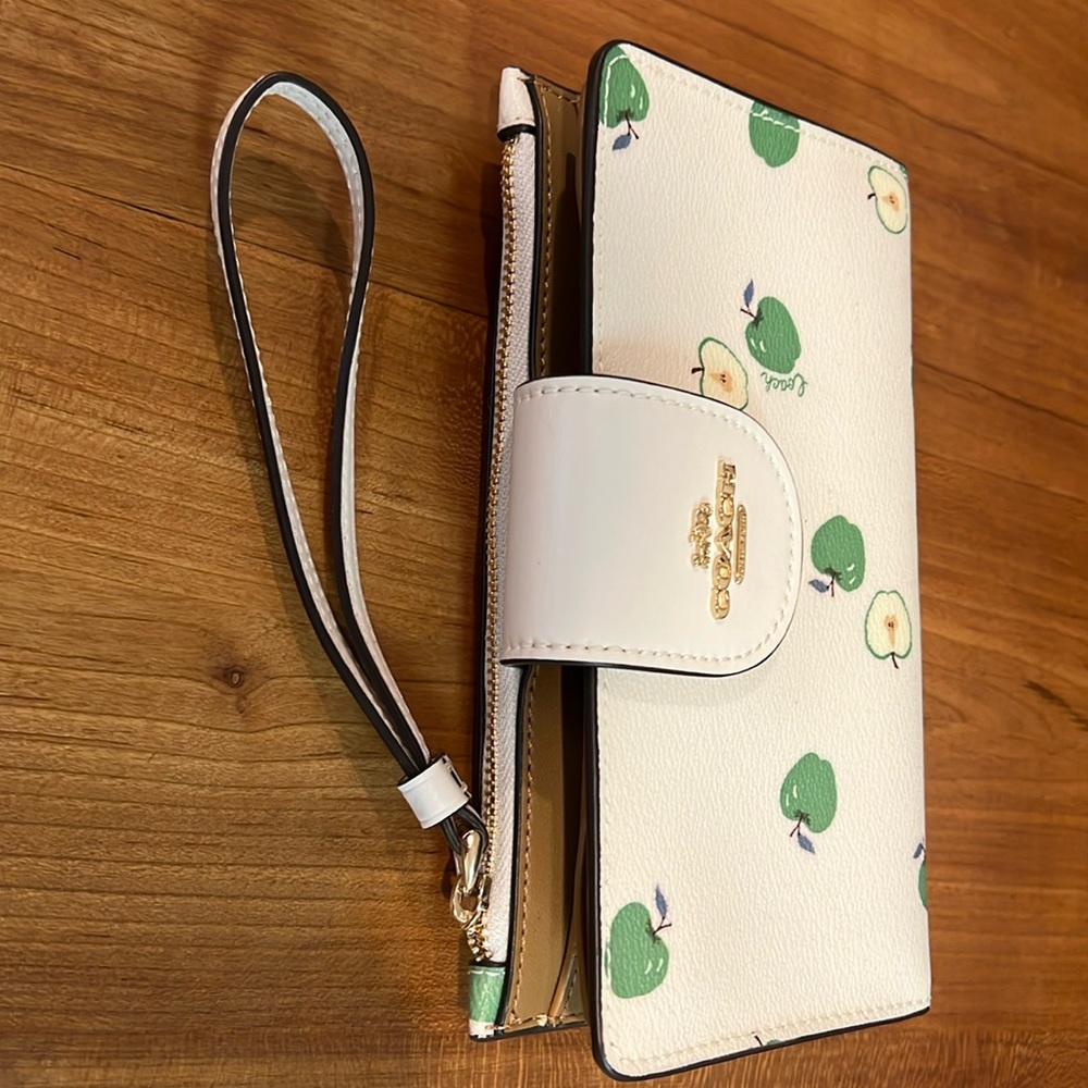 Coach wristlet, off-white color with green apple print, NWOT